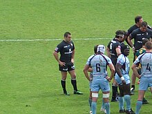 Een groep spelers op het veld