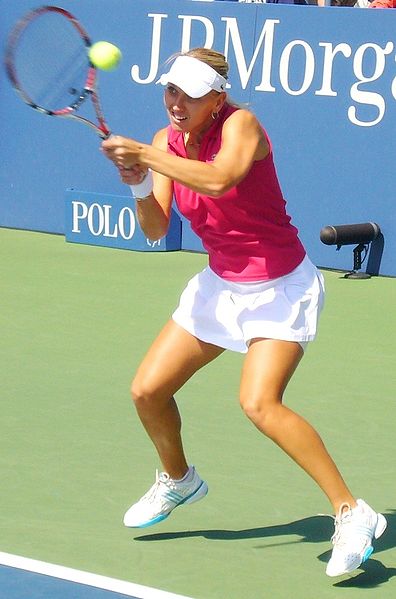 Elena Vesnina in a doubles match with Maria Kirilenko