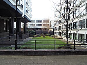 The sunken garden between the tower base and the two low rise blocks, which are threatened with demolition as of 2023 Elmbank Gardens - geograph.org.uk - 3788331.jpg