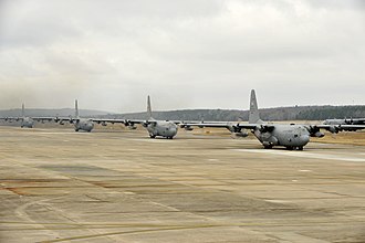 327th Airlift Squadron C-130H Hercules' (December 2014) First Total Force Integration four ship formation for 913th AG 141202-F-MZ799-007.jpg