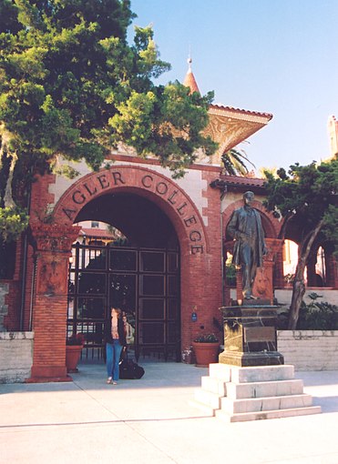 A statue of Henry Flagler, who constructed the Ponce de Leon Hotel, stands guard at the King Street entry to Flagler College.