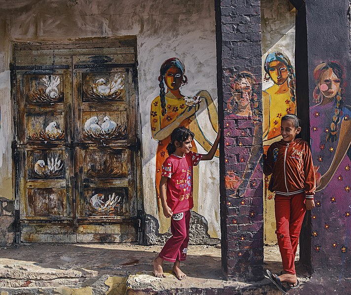 File:Girls playing in the colored city o.jpg