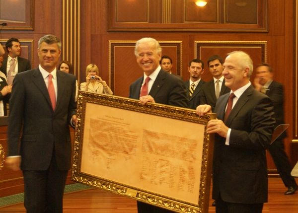 Hashim Thaçi (left) and then-US Vice President Joe Biden with the Declaration of Independence of Kosovo