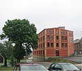 Production building in the town center (factory building)