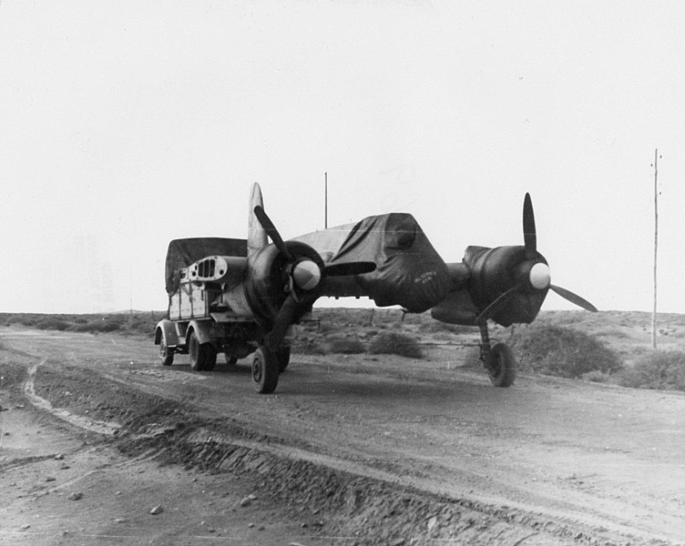 File:Henschel Hs 129 with wings removed outboard of engine nacelles, being towed by an Opel Blitz truck, circa 1939. (48864661086).jpg