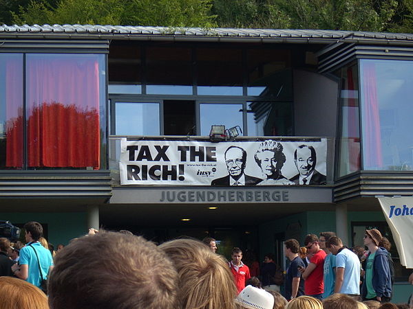 "Tax The Rich" banner at an International Union of Socialist Youth campaign for a financial transaction tax