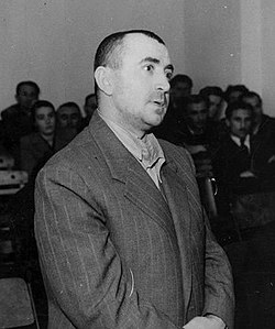 Дзодзе по време на процеса срещу него през май 1949 г.