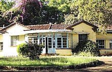 The front view of the Lenana School Sanatorium in 2011. Students accessed the clinic from the opposite end (chapel side) of the sanatorium while other school residents accessed it mainly from this end. The Ministry of Health (Kenya) has classified the school sanatorium as a 'Level 2' clinic. LenanaSchoolSanatorium.jpg