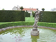 Pond Garden looking north towards the house through the Seat Garden and Croquet Lawn Lytes Cary 2009 House from the Pond Garden.JPG