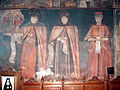 Tabloul votiv aflat pe peretele de sud al naosului. Aici sunt pictaţi noii ctitori: Vasile Lupu, Ştefăniţă Lupu şi Doamna Ecaterina, îmbrăcaţi în costumele de ceremonie.