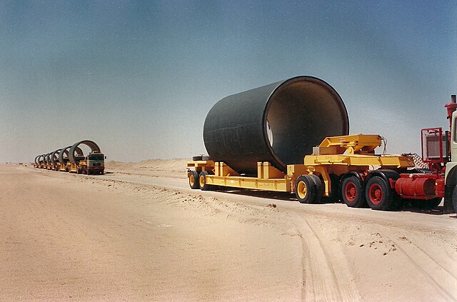 Transport of pipe segments for the Great Manmade River in Libya: a network of pipes that supplies water from the Nubian Sandstone Aquifer System.
