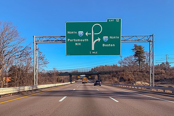 To continue on I-95 northbound, motorists must make a sharp clockwise curve at exit 26 (old exit 12) in Canton.