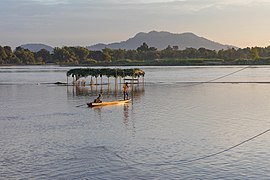 Mekong pirogue at sunset in the 4000 islands