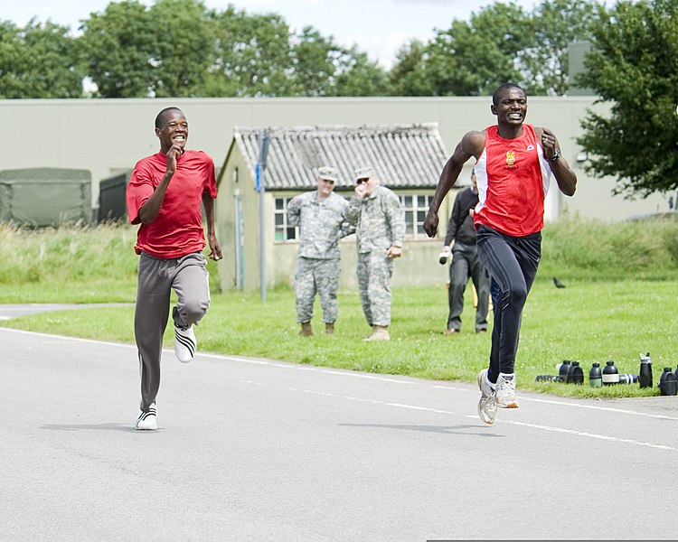 File:Mike Tebulo, left, a Malawian Olympic marathon runner, races toward the finish line with British Armed Forces Lance Cpl. Francis Okumu, with the Allied Rapid Reaction Corps (ARRC), at Imjin Barracks, Innsworth 120712-O-ZZ999-003.jpg