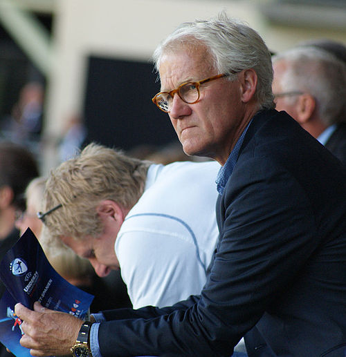 Olsen as national team manager, attending the 2011 European Under-21 Championship. Assistant manager Peter Bonde is to his left.