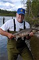 Novice fisherman with a chum salmon taken at Alexander Creek, Matanuska-Susitna Borough, Alaska.jpg