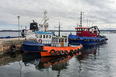 Old tugboats moored in the South Harbor, Lysekil