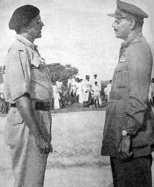 Major General El Edroos (at right) offers his surrender of the Hyderabad State Forces to Major General (later General and Army Chief) J. N. Chaudhuri 