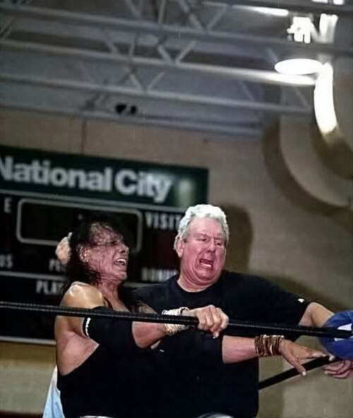 Snuka in a match against Bob Orton Jr.