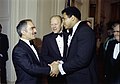 Photograph of King Hussein of Jordan and President Gerald R. Ford Greeting Heavyweight Boxer Muhammad Ali in the Receiving Line at a State Dinner Held in His Majesty's Honor - NARA - 7840017.jpg