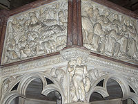 Natividá y Adoración de los Magos, figures del púlpitu del bautisteriu de Pisa, obra de Nicola Pisano.