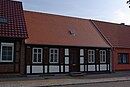 Residential building with farm buildings