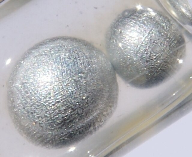 Potassium pearls (in paraffin oil, ~5 mm each)