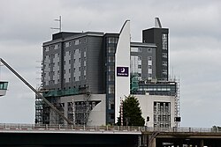 The Premier Inn in Kingston upon Hull, with recladding work underway since at least last year or the year before nearly complete on the structure. Also visible is the control tower of the Myton Bridge.