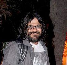 The song is composed by Pritam marking his first collaboration with Dharma Productions. Pritam C.jpg