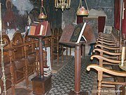 Eastern Orthodox choir stalls (kathisma) on the kliros with analogia for liturgical books