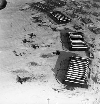 Hangars at RAF Driffield with Whitleys of 77 Squadron in front RAF Driffield WWII IWM HU 91931.jpg