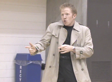 Rick Astley impersonator rickrolling a basketball game.png