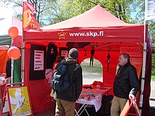 A Communist Party of Finland tent during the 2015 World Village Festival SKP World Village Festival.JPG
