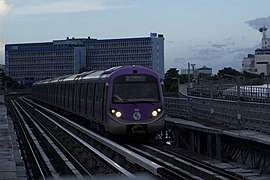 Sealdah-bound metro train approaching Central Park, 2022