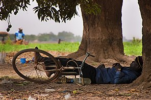 Sleeping man in Ouagadougou.jpg