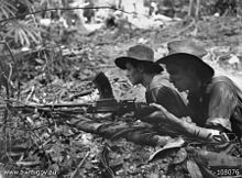 Two soldiers from the 2/23rd Battalion during the attack on 'Freda' feature Soliders tarakan (AWM 108076).jpg