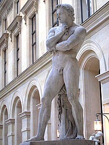 Patung marmer Spartacus karya Denis Foyater di depan bangunan neoklasik.
