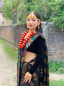 Limbu girl wearing dhaka dress. Terai limbuni waering dhaka dress.jpg