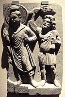 The Buddha with his protector Vajrapāni. Gandhara, 2nd century