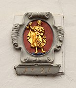 Relief (1727) of Saint Peter at historical building Krahnenstraße 30 in Trier, Germany.