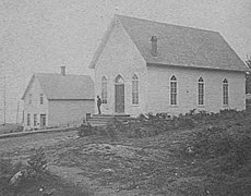The pre-Fire Trinity Church, Seattle's first Episcopal church, built at Third and Jefferson in 1870, shown in 1873.