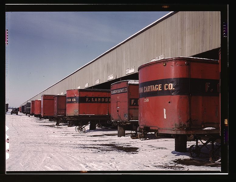 File:Truck trailers line up at a freight house to load and unload goods 1a34619v.jpg