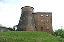 Former Dutch windmill with mill tower and technical equipment as well as storage, machine house and transformer station