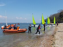 Dinghy sailing class at East Cowes, Isle of Wight UKSA dinghy sailing training course at East Cowes, Isle of Wight, England.jpg