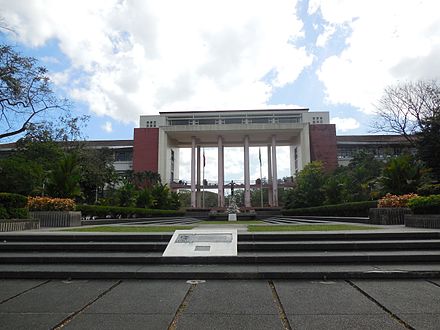 The Oblation Plaza showing the Oblation monument and the facade of Quezon Hall.