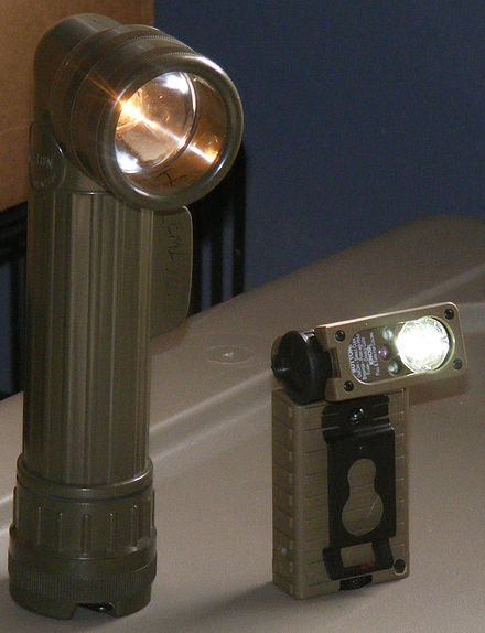 The angle-head flashlight on the left uses an incandescent bulb, while the adjustable angle-head flashlight on the right uses LEDs to give white, red, blue, and infrared light