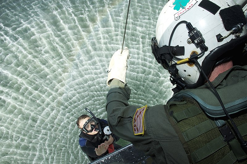 File:US Navy 090819-N-4134D-698 Naval Air Crewman 2nd Class John Herrman, an aviation rescue swimmer instructor, is hoisted into the cabin of an SH-60F Sea Hawk helicopter assigned to Training Air Wing (TRAWING) 5 by Naval Air Crew.jpg