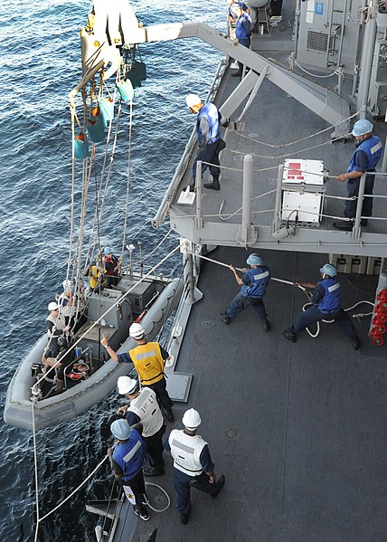 File:US Navy 101218-N-3415O-030 Sailors assigned to the guided-missile cruiser USS Lake Champlain (CG 57) recover a rigid-hull inflatable boat during an.jpg