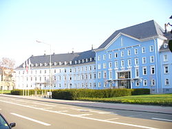 Main building of the residential complex with the raised central part.