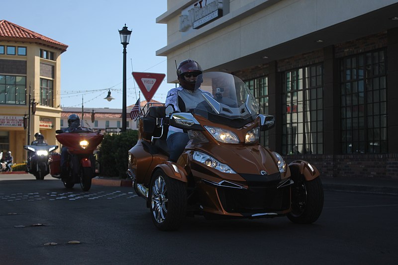 File:Woman Returning on Orange Can-Am Spyder - Las Vegas Ride for Kids 2019.jpg